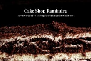 Close-up cover photo for "Cake Shop Ramindra" article, featuring a layered homemade chocolate cake with white cream and crumb texture.