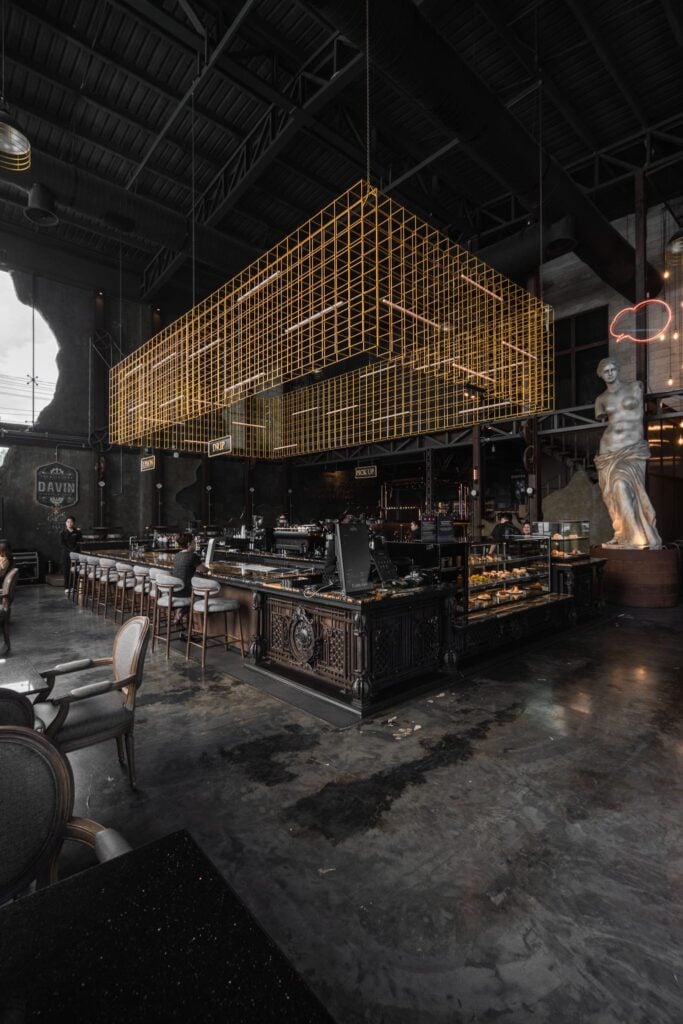 A romantic industrial-style cafe interior on Valentine’s Day, designed for meaningful moments in a warm, atmospheric space