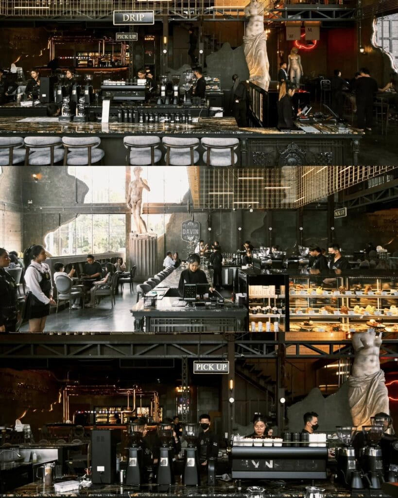 Interior scene of Davin Cafe in Bangkok featuring a large specialty coffee bar and drip station where baristas prepare drinks and pastries, highlighting the vibrant café atmosphere and premium coffee experience.