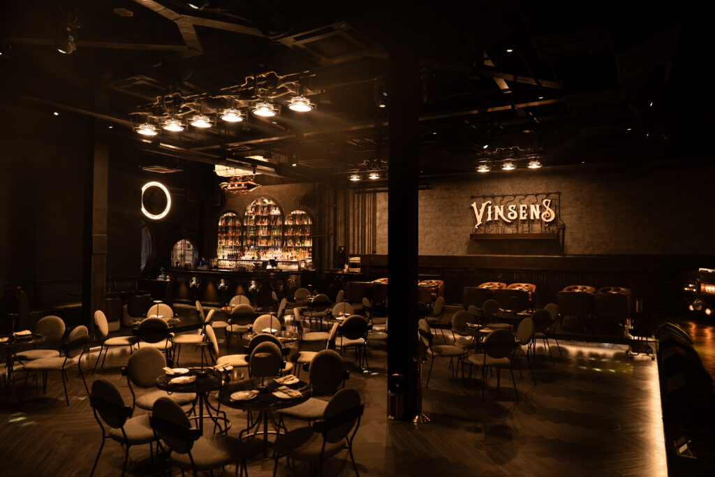 Elegant event dining space inside Vinsens cocktail bar in Bangkok, combining luxury lighting, curated seating, and a refined atmosphere for private gatherings and nightlife experiences