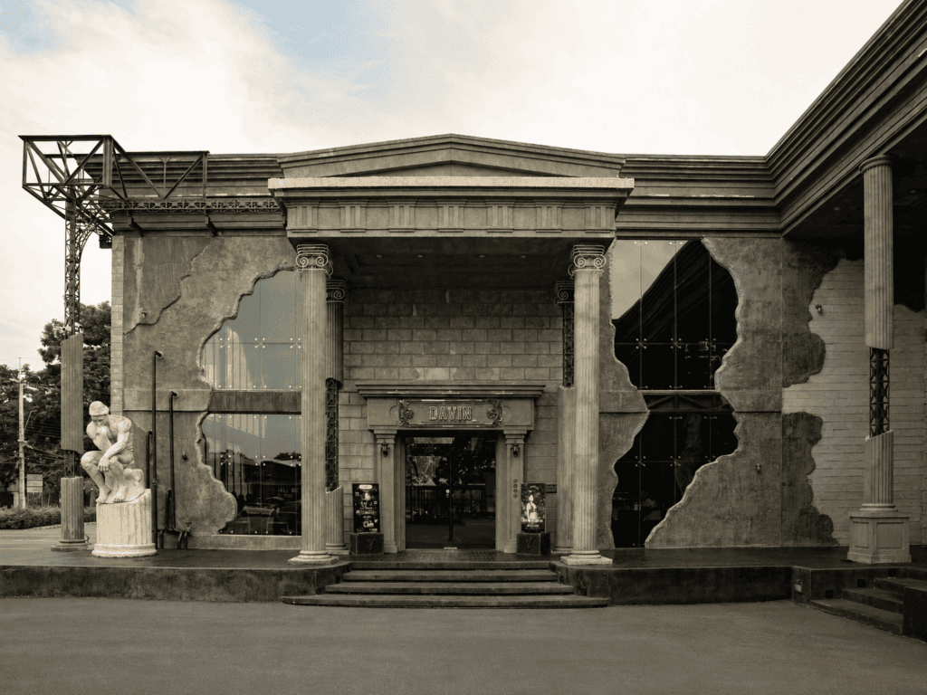 Exterior of DAVIN CAFE, a family restaurant in Ramintra featuring European-inspired architecture and a spacious setting for family gatherings