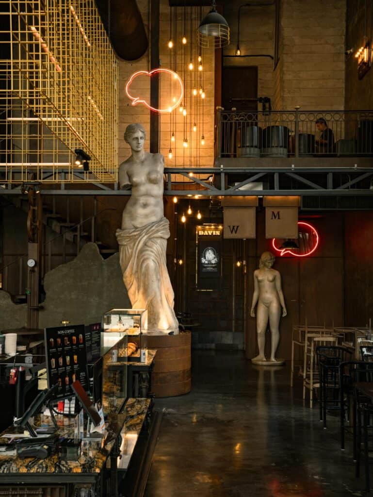 European-style cafe in Bangkok with classical interior design, sculptural details, and a warm atmosphere at DAVIN CAFE