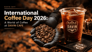 International Coffee Day 2026 at DAVIN CAFE with roasted coffee beans and iced coffee highlighting coffee aroma, flavor and origin stories